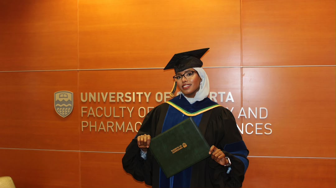 Graduate with University of Alberta diploma cover — Faculty of Pharmacy and Pharmaceutical Sciences